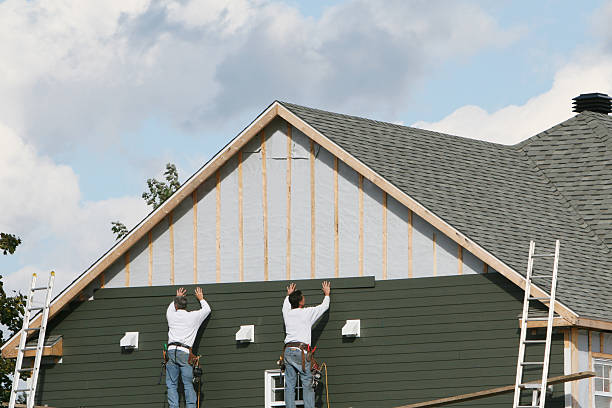 Professional Siding technician working in Aurora, CO